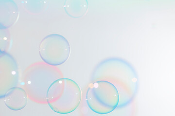 Beautiful Transparent Colorful Soap Bubbles on White Background
