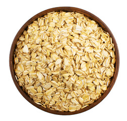 Oat flakes in a wooden bowl on a white background. Isolate. Top view.