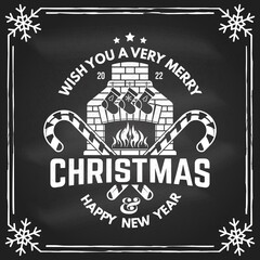 Wish you a very Merry Christmas and Happy New Year stamp, sticker, patch with fireplace, Christmas socks, christmas candy. Vector on the chalkboard. Design for xmas, new year emblem in retro style.
