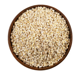 Pearl barley in a bowl on a white background. Top view. Isolate.