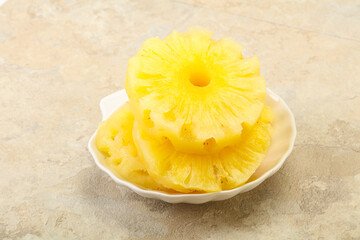 Sweet pineapple rings in the bowl