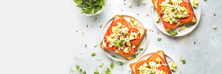 Sandwiches with tomato and microgreens banner.
