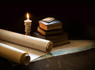 Still life from ancient books with candles