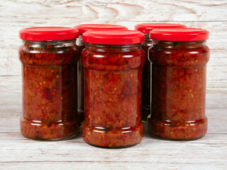 Jars of zacusca, a popular Romanian appetizer. Zacusca is a spread made from vegetables - aubergines, peppers, onions, carrots