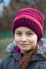 Portrait of preteen girl in winter clothes