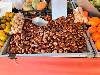 Chestnuts for sale at an outdoor market stall