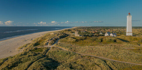 Panoramic view of Blåvand lighthouse on wide dune of Blåvandshuk with beach view on the west coast of Jutland, by Esbjerg, Denmark. 