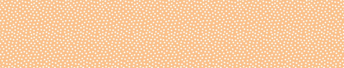 Peach seamless pattern with white dots