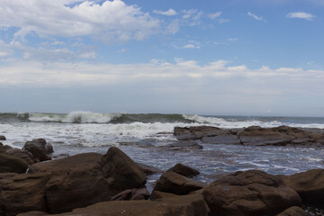 waves crashing on rocks