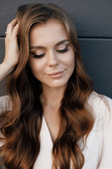 Young happy smiling woman in hat outdoor