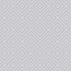 Seamless pattern with white hand-drawn diamonds on a gray background