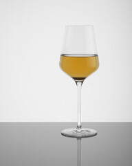 glass of white wine on the table with a reflection