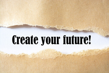 Create your future. words. text on brown paper on torn paper background.