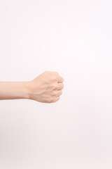 The hand clenching in front of the white background