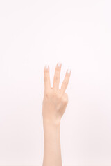 hand showing number three In front of the white background