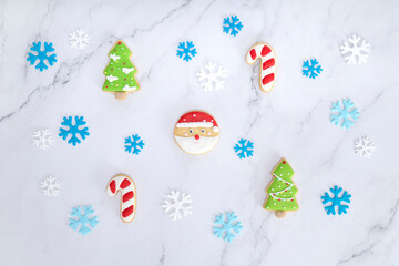 Background decorations with Christmas theme sugar coated biscuits.