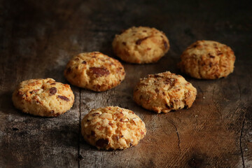 Chocolate cookies on wooden table.