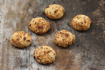 Chocolate cookies on wooden table.