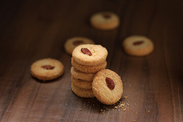 Chocolate cookies on wooden table.
