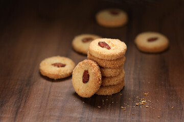 Chocolate cookies on wooden table.