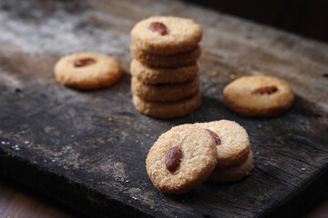 Chocolate cookies on wooden table.