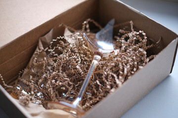 delivery box from a store and discovers a broken glass. An improperly packed item crashed on...