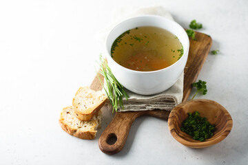 Homemade chicken stock with green onion