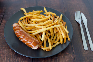 Bratwurst, German sausage with French fries