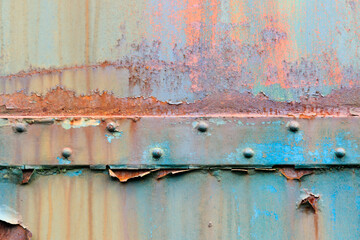surface texture of rust and peelling paint on metal
