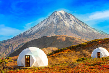 White glamping on the slope of a volcano in autumn on the Kamchatka Peninsula. Selective focus - obrazy, fototapety, plakaty