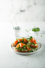 Homemade salmon bruschetta with green pea