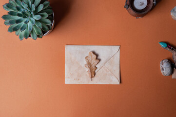 Occult or spiritual backgound with envelope scarab palo santo copy space flat lay