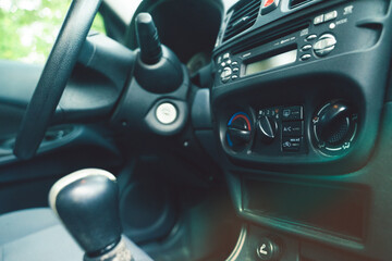 Close up Instrument automobile panel with climat control view with air conditioning buttons.