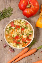 pasta and vegetable soup in bowl