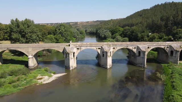 Aerial view of Nineteenth-century bridge over the Yantra River, known as the Kolyu Ficheto Bridge in Byala, Ruse region, Bulgaria