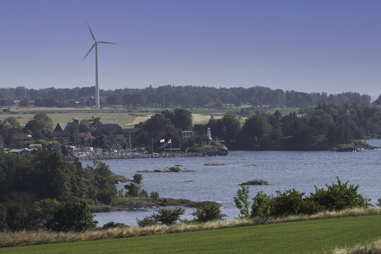 Beautiful view of wind turbines and lake over Hastholmen from Omberg, Sweden