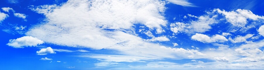 White cumulus clouds blue sky background panorama, beautiful cloudscape wide panoramic view, cloudy skies backdrop, fluffy cloud texture, sunny day heaven, cloudiness weather, ozone layer, copy space