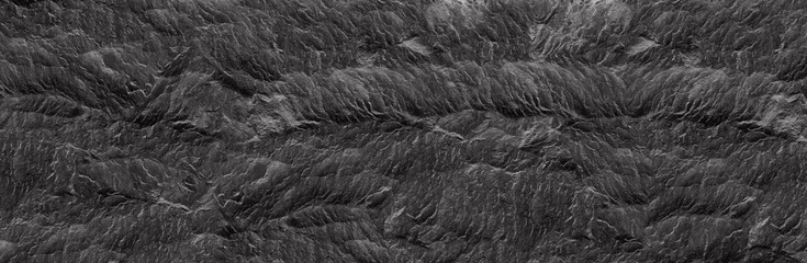 Abstract dark grey black slate background or texture.