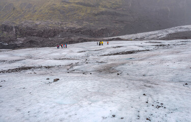 People hiking on the Svínafellsjökull outlet of the Vatnajökull Glacier in Iceland