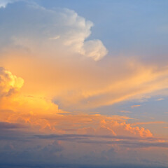 Colorful cloudy sky at sunrise.