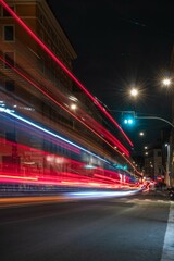 Fototapeta na wymiar cars-red lights traffic in the night in Rome