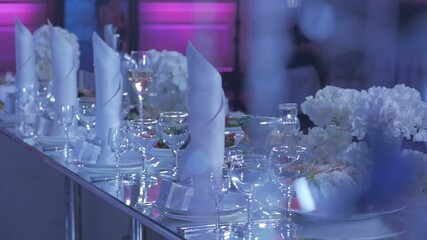 Luxurious restaurant, serving dishes and glasses for guests