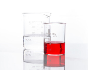 Close up chemical ingredient on white laboratory table. Potassium Ferricyanide Liquid in Beaker. Side View