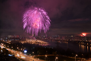 Purple fireworks over the city
