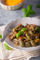 Spinach gnocchi with ham