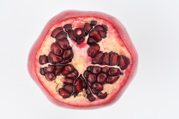A ripe pomegranate fruit on the background