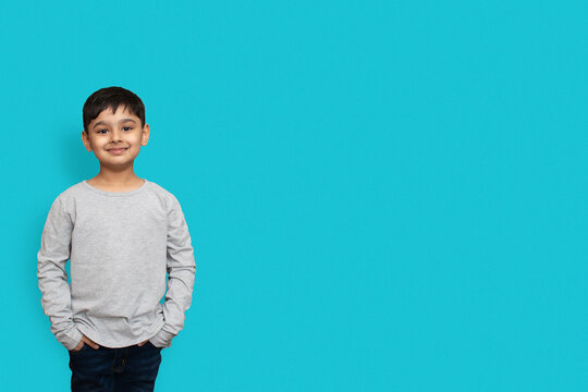 Shirt design and people concept - close up of little boy in plain tshirt front and rear isolated. Mock up template for design print