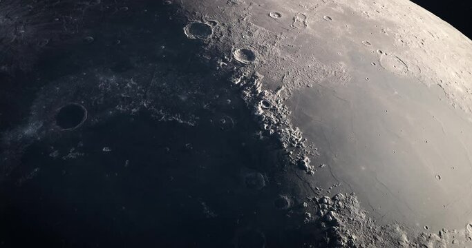 Moon 4K. High resolution and super detailed lunar surface. Many craters and Caucasus mountains. Moon terminator shadow moving slowly. Cinematic space scene. Elements of this image furnished by NASA.