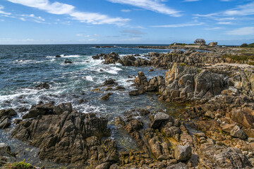 Rocky coast at the Atlantic Ocean in France landscape. Selective focus.
