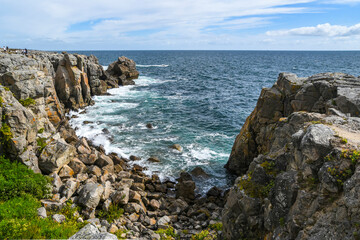 Fototapeta na wymiar Rocky coast at the Atlantic Ocean in France landscape. Selective focus.
